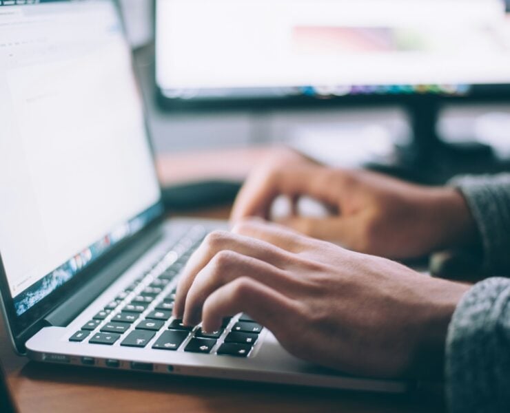 A person working on a laptop 